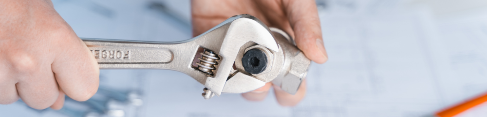 fixing pipe with wrench